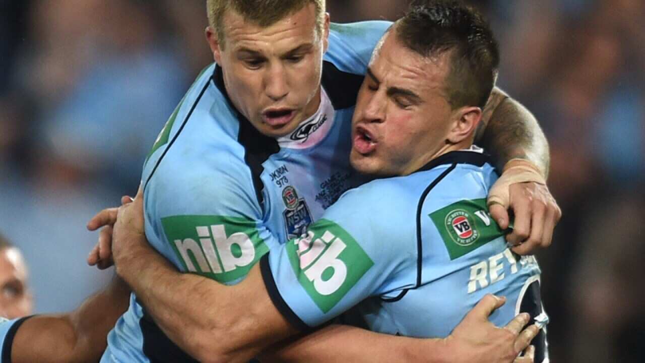 NSW Blues players Trent Hodkinson (L) and Josh Reynolds