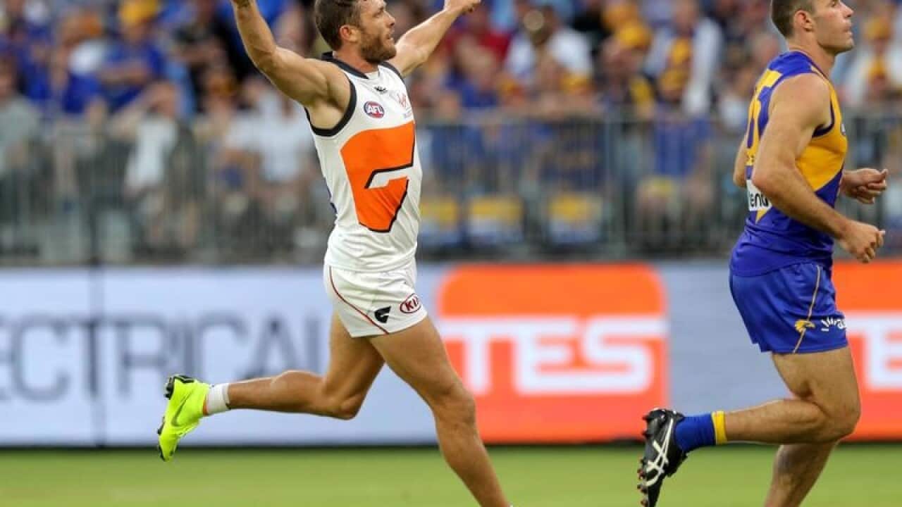 Sam J. Reid of the Giants celebrates