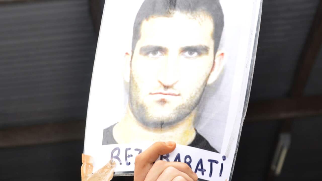 A picture of slain asylum seeker Reza Berati