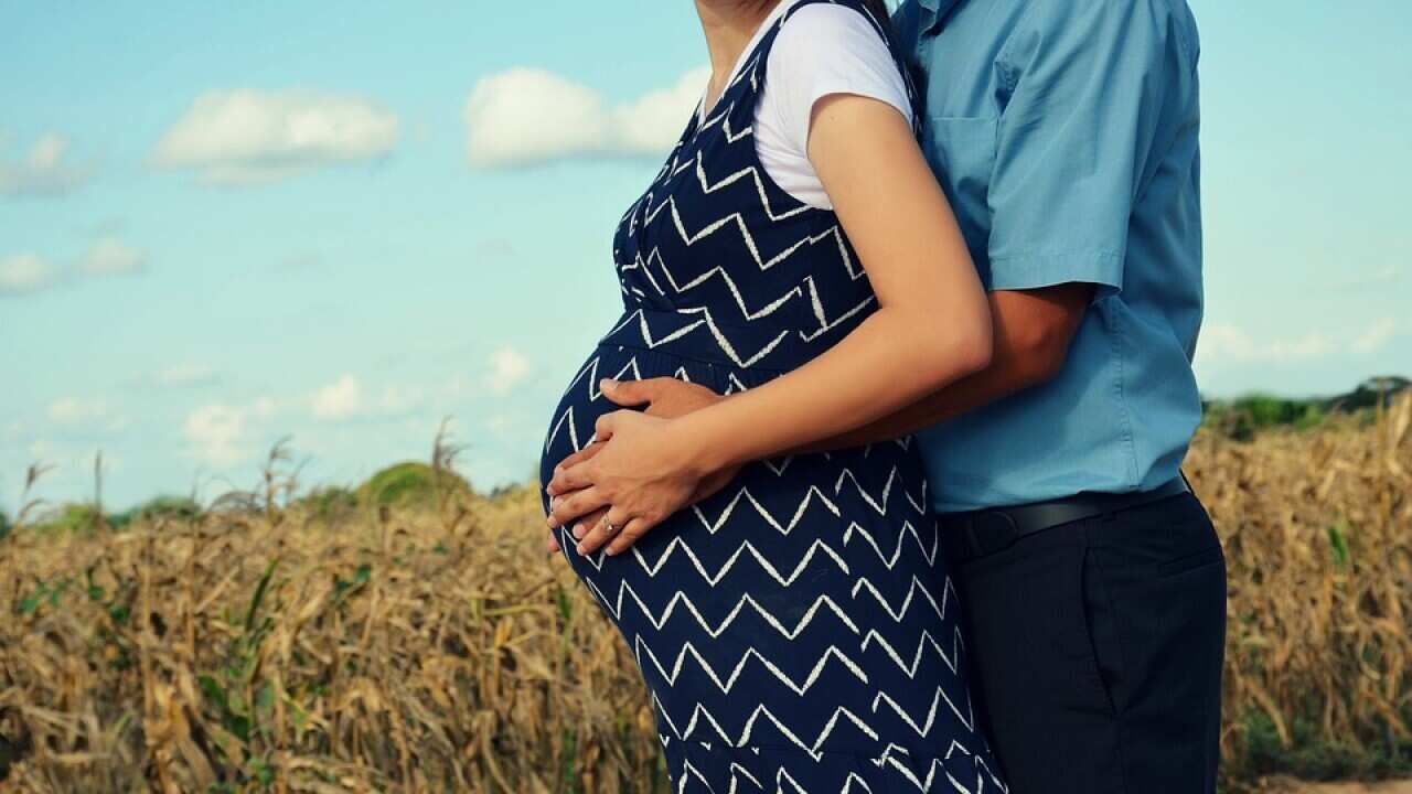 pregnant couple