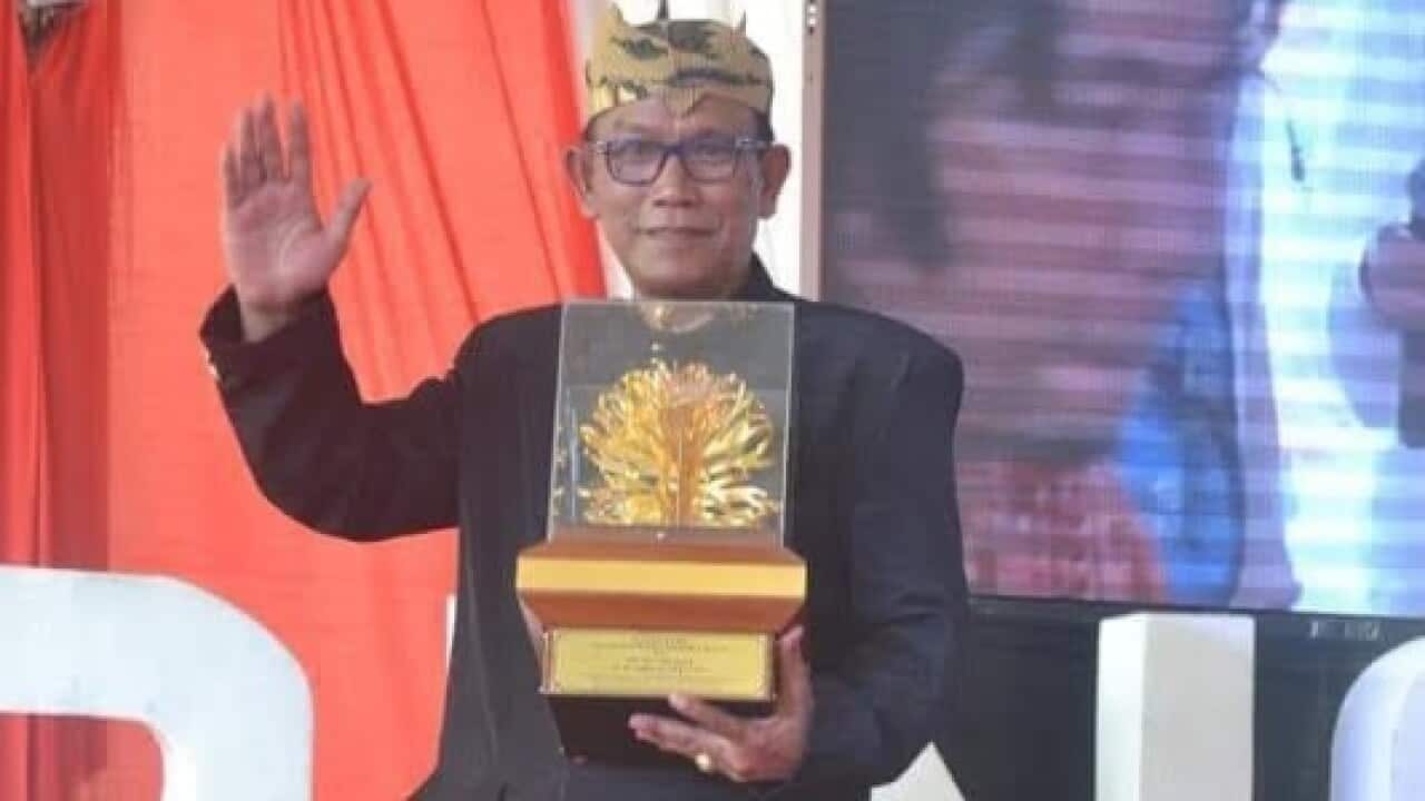 Ir H. Bambang Irianto, founder of Glintung Go Green after receiving Kalpataru Award, Environmental Advisory category, from the Coordinating Minister for Economy, 29 Aug 2018.