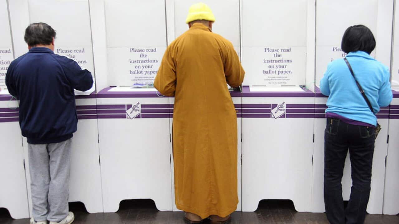 Voting in Sydney the 'old fashioned' way in 2010 (AAP)