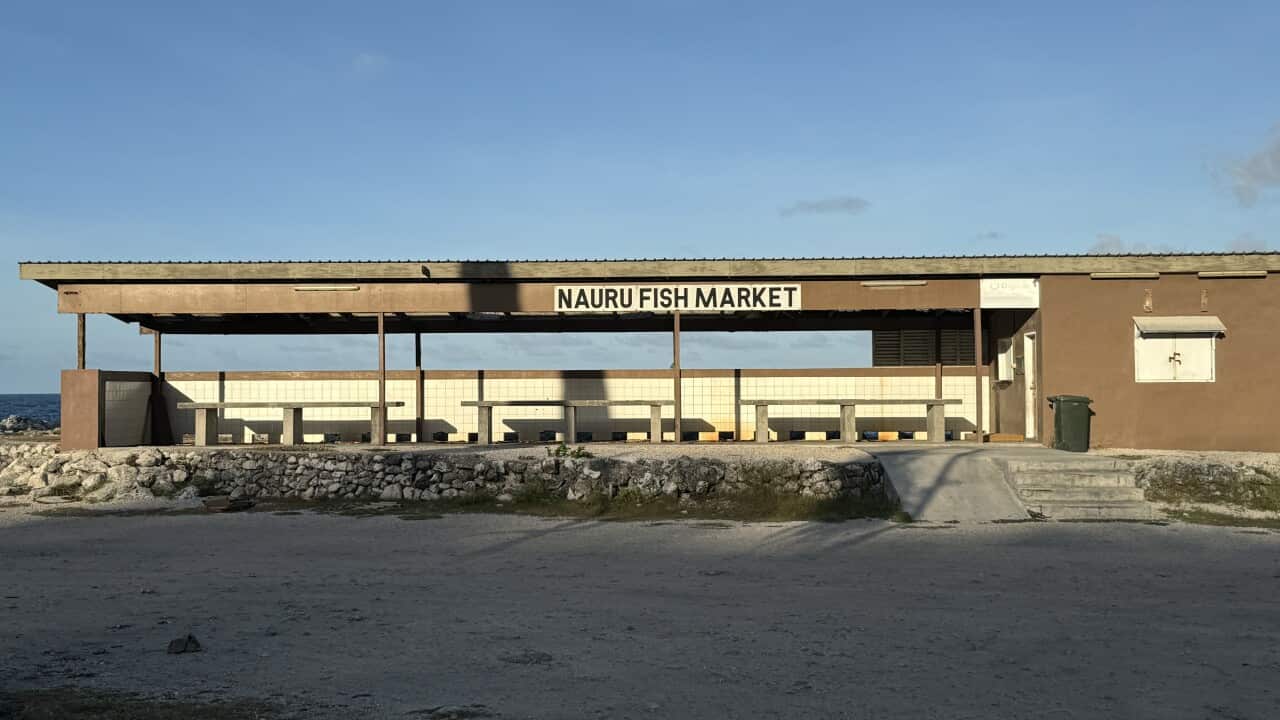 A wooden structure that says Nauru fish market