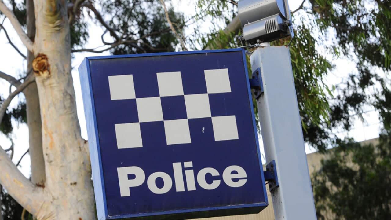 A police station sign