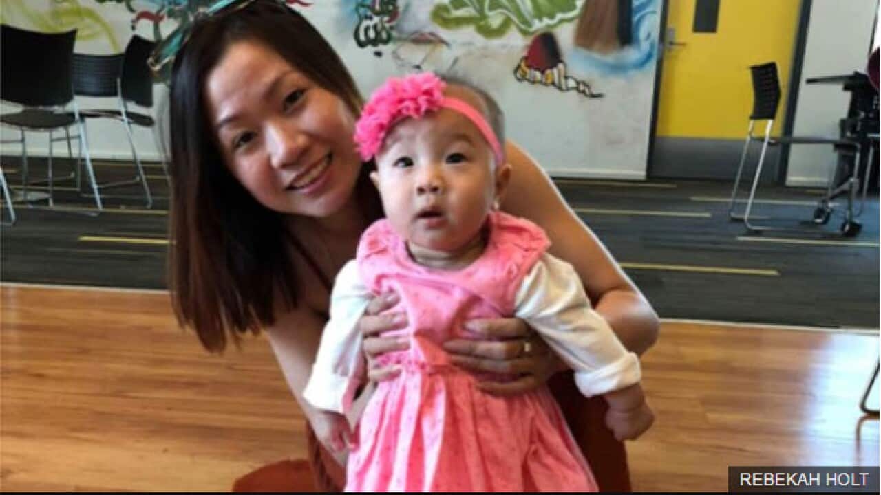 Huyen Tran and her baby in Australia