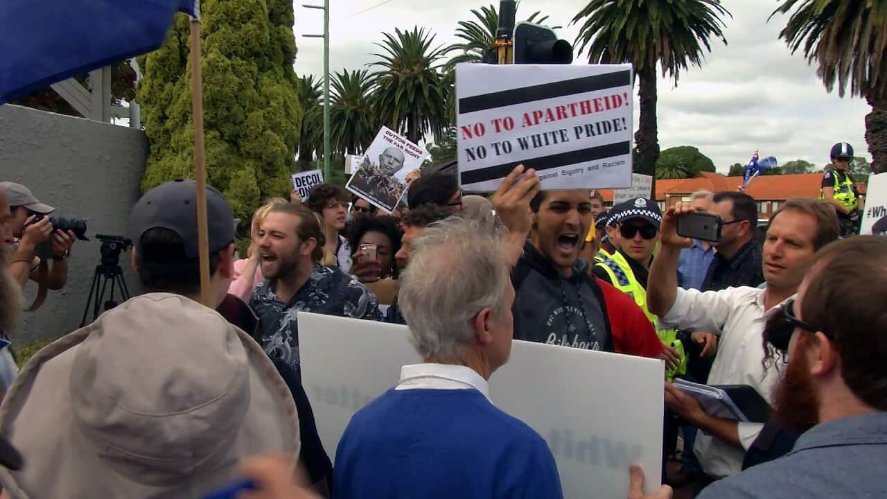 Protesters clash outside Foreign Minister Julie Bishop's Perth office.