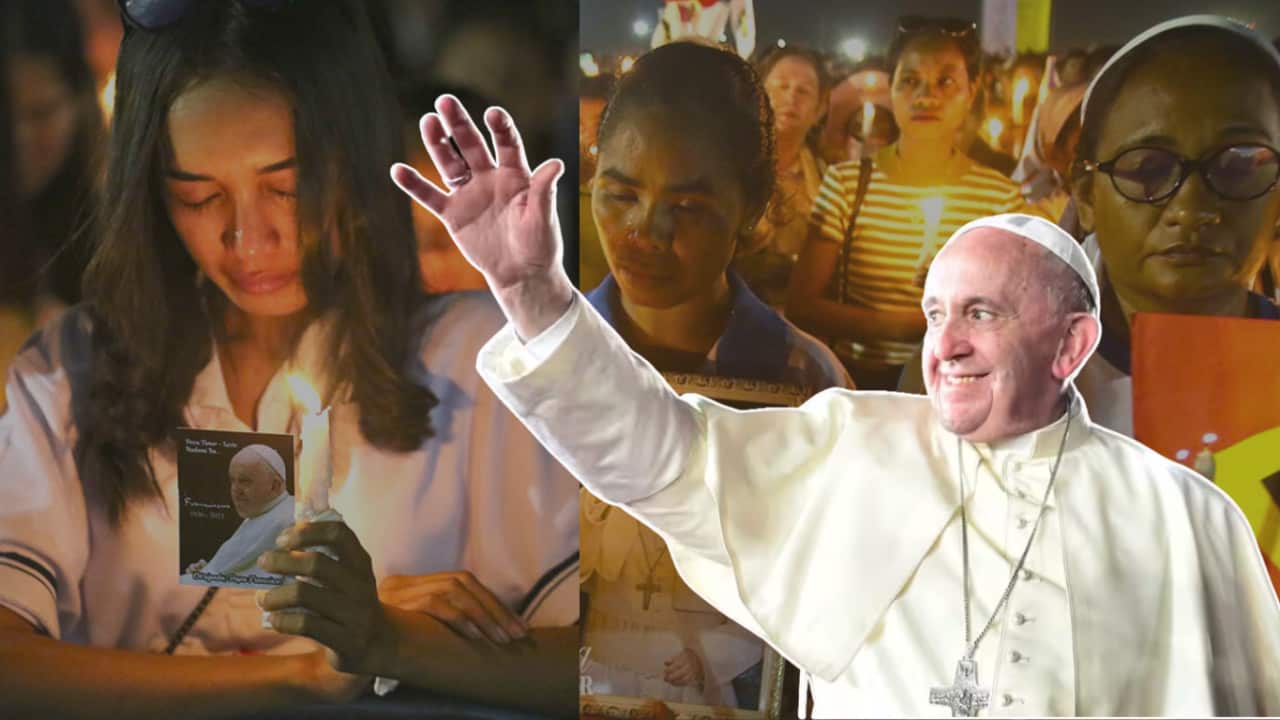 Sarani Timor-oan sira atende misa iha tasi- tolu, fatin ne'ebe Amu Papa Francisco halo misa iha fulan Setembro tinan kotuk.