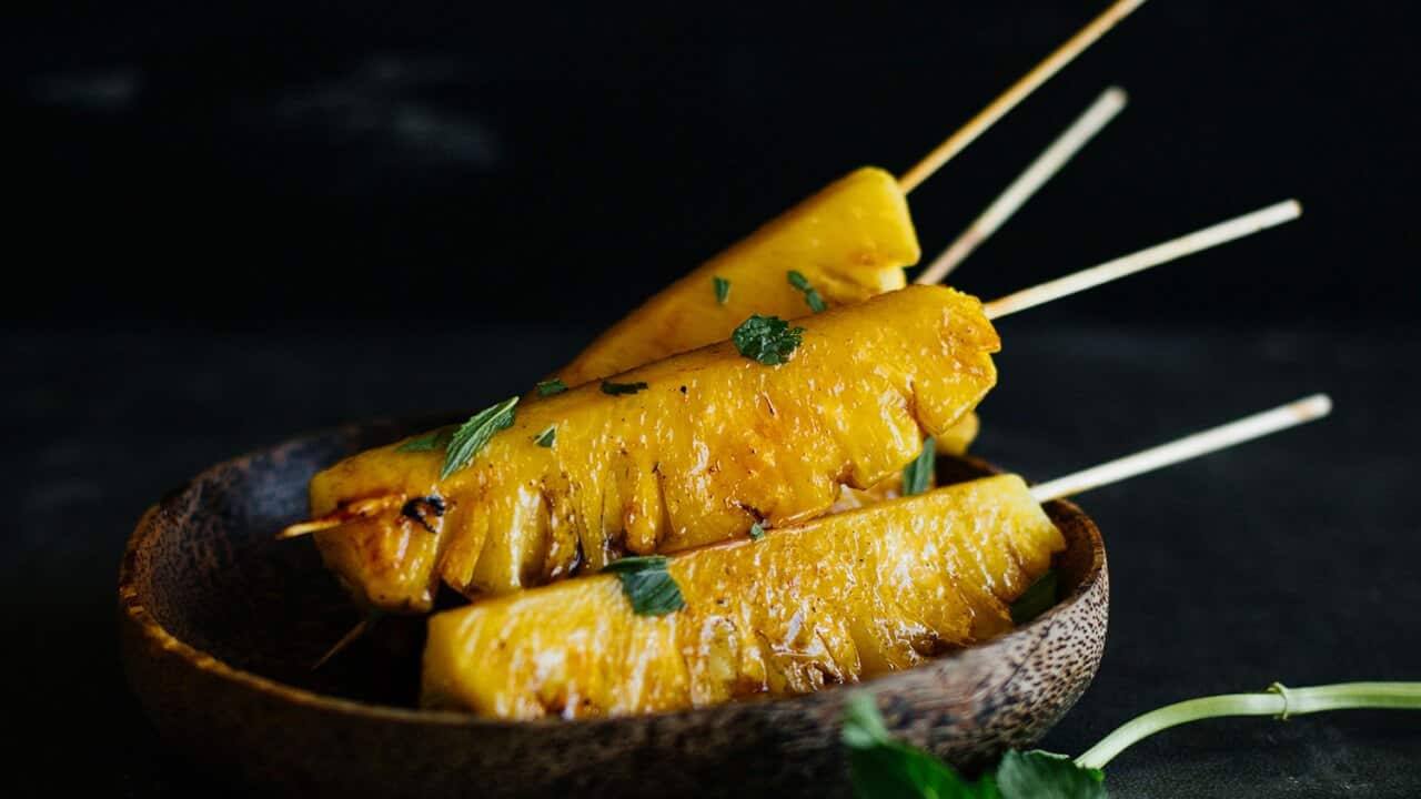 Grilled pineapple with cinnamon sugar and mint