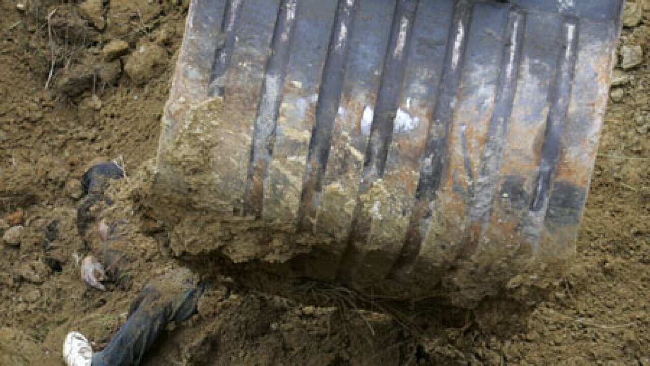 philippines_massacre_body_091124_B_AP_1783938192