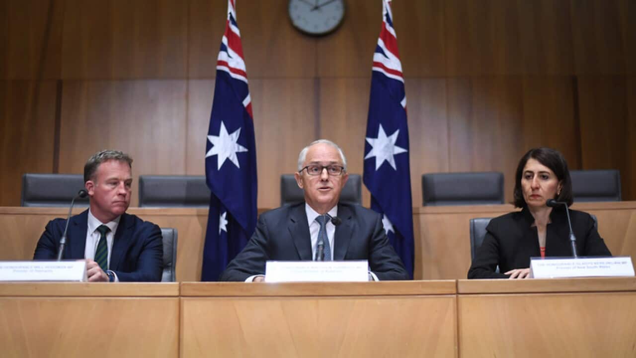 Australian Prime Minister Malcolm Turnbull, State Premiers and Chief Ministers attend a signing ceremony for a special meeting on counter-terrorism of the Council of Australian Governments (COAG) at Parliament House in Canberra, Thursday, October 5, 2017.