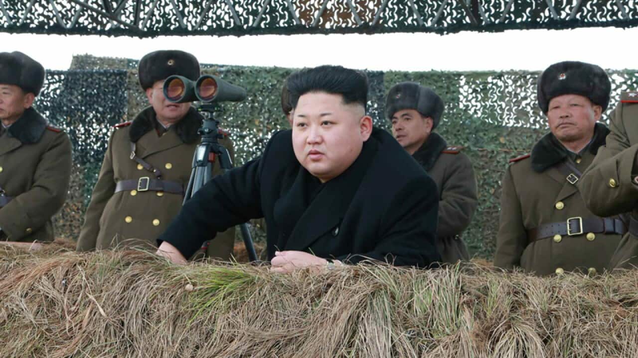North Korean leader Kim Jong-un observing the military's training