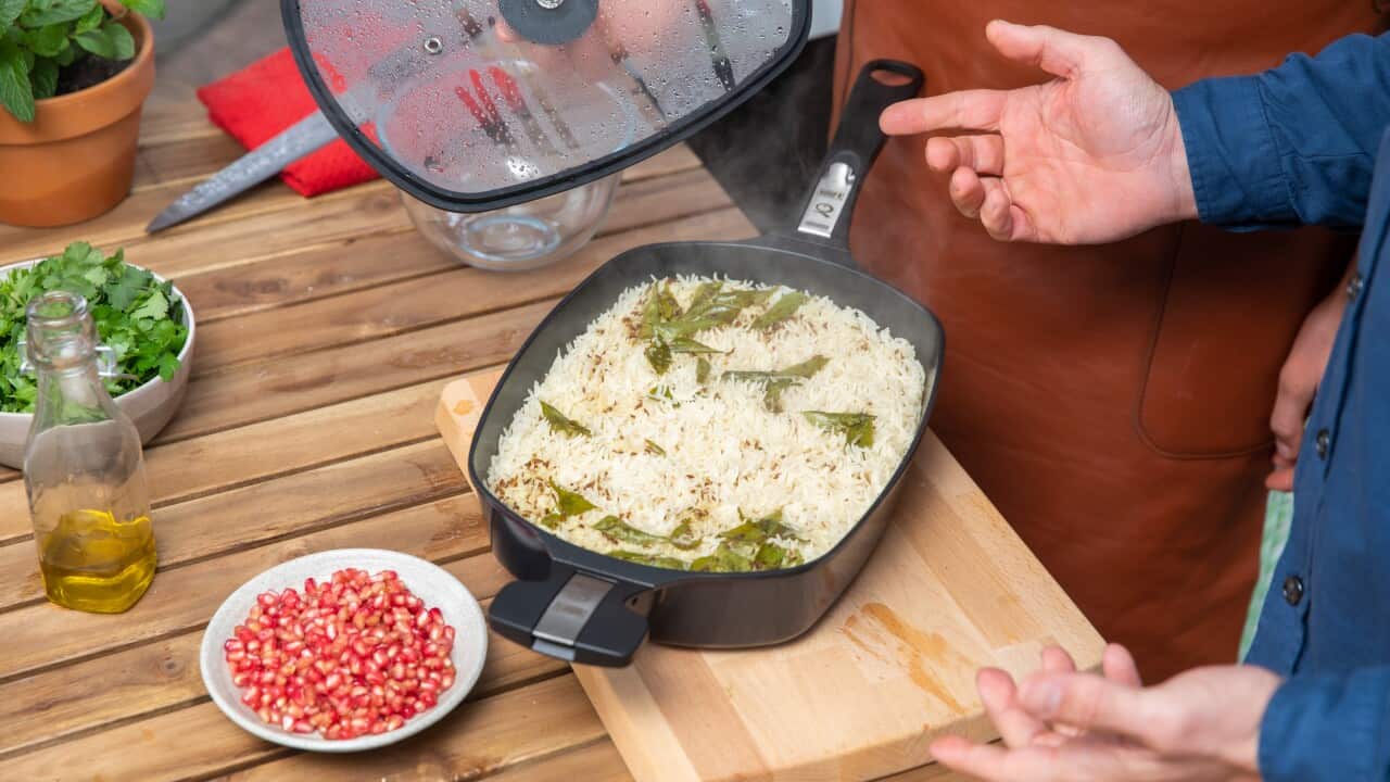 Garlic and Curry Leaf Infused Basmati steams as Laura Romeo lifts the lid on the pan