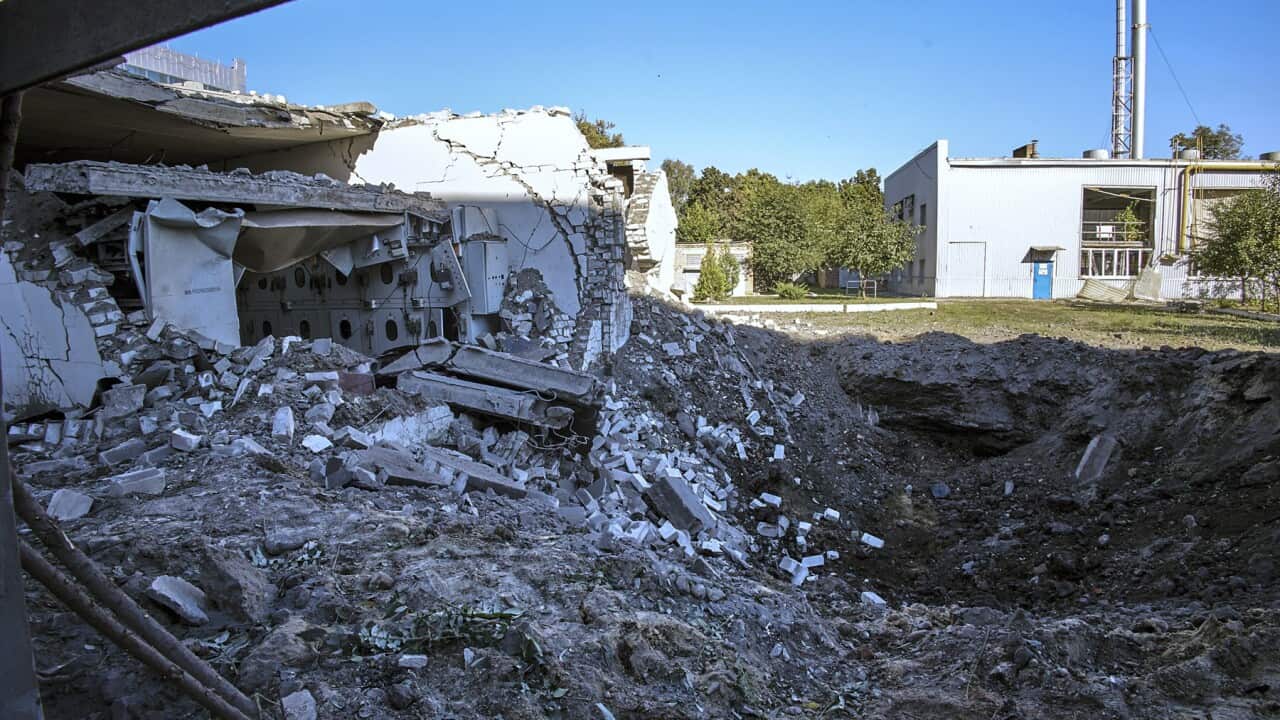A crumbled building damaged by shelling in Kharkiv, Ukraine (AAP).jpg