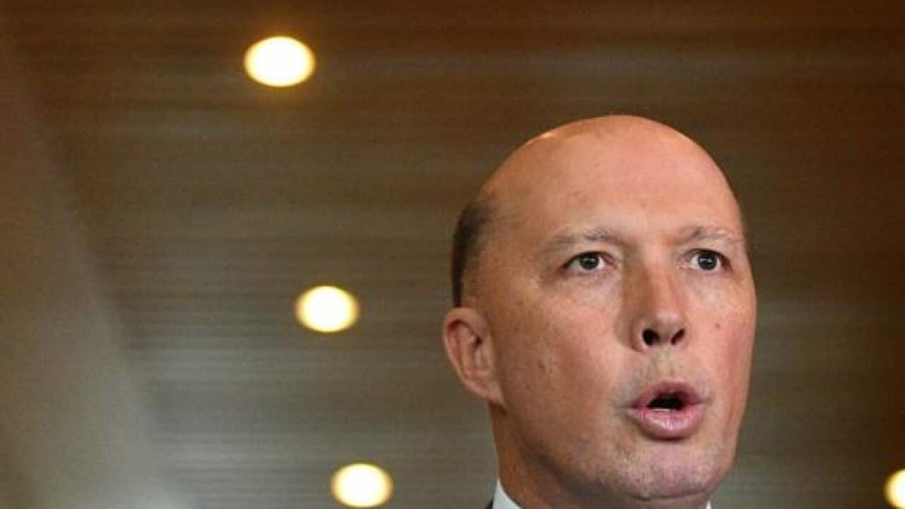 Minister for Home Affairs Peter Dutton at a press conference