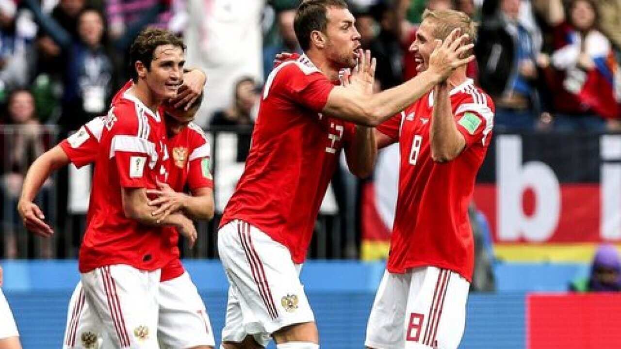 Moscow - 14/06/2018 - Opening World Cup 2018 - Russia X Saudi Arabia. Gazinsky and Dzyuba of Russia celebrate their team's goal against Saudi Arabia at Luzhniki Stadium in Moscow. Photo: Ale Cabral / AGIF (via AP)