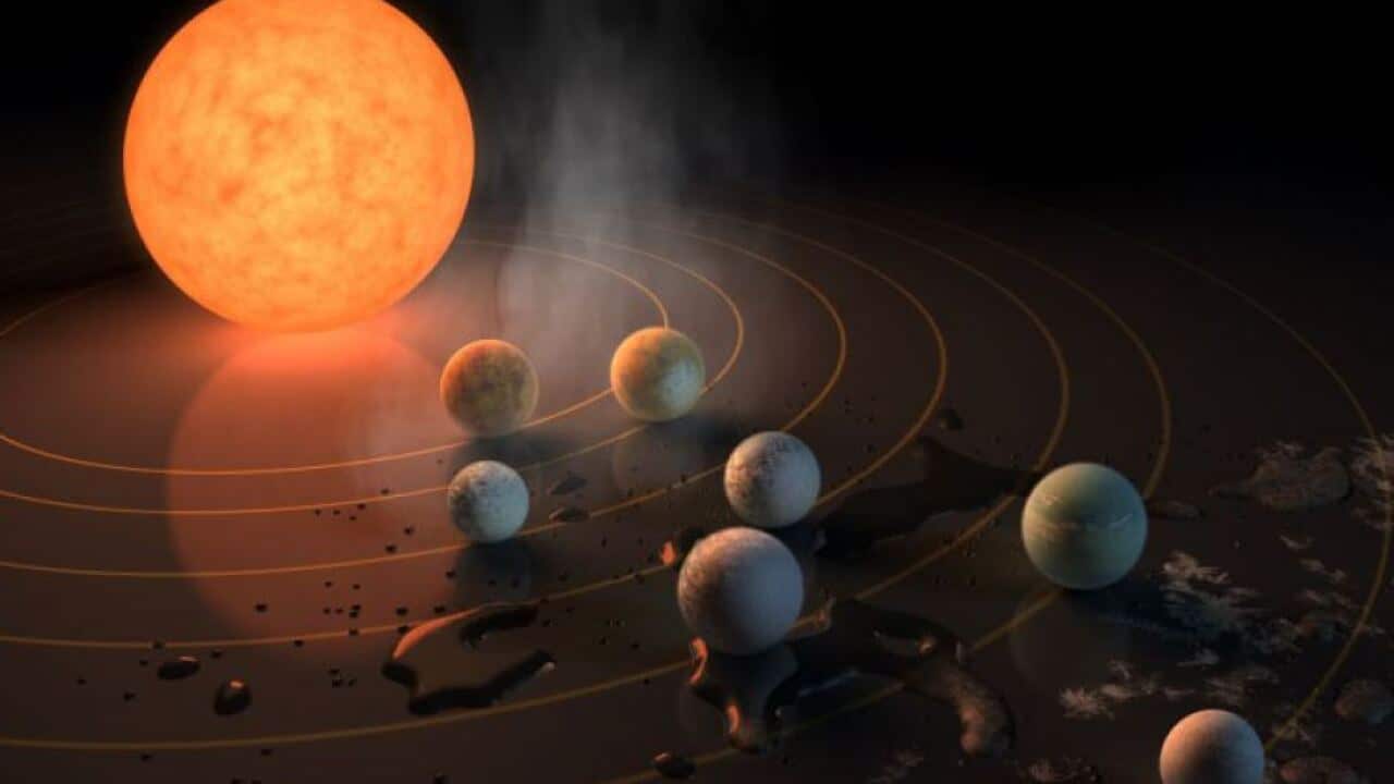 An artist's impression of what the alien solar system looks like.