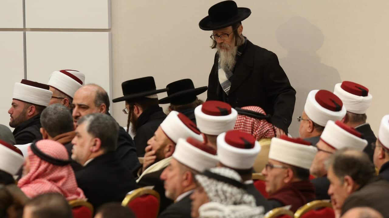 Delegates from Neturei Karta Orthodox Jews sect and Muslim clerics attend a meeting of the Palestine Liberation Organization (PLO) Central Council, at his presidency compound in the West Bank town of Ramallah