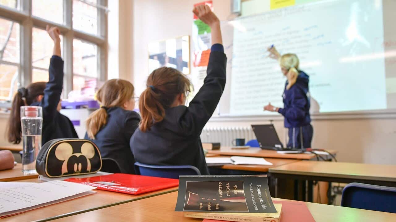 Teacher and students in a classroom