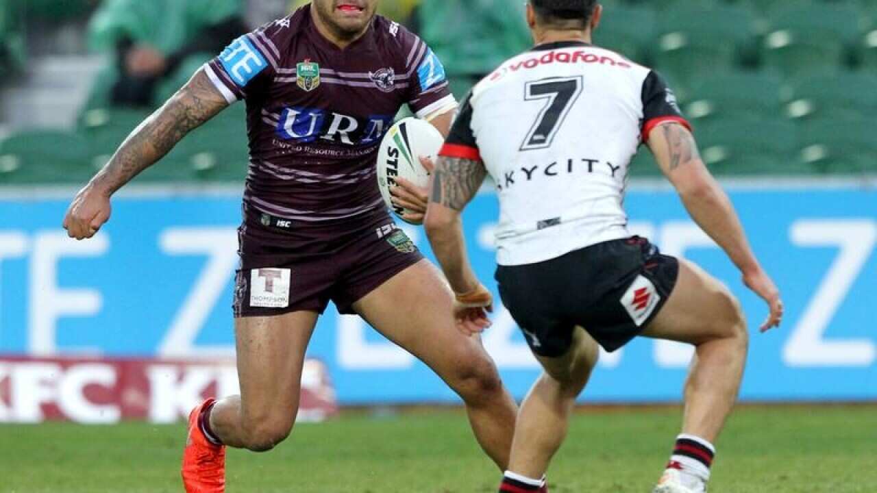 Dylan Walker of the Eagles takes on Shaun Johnson.
