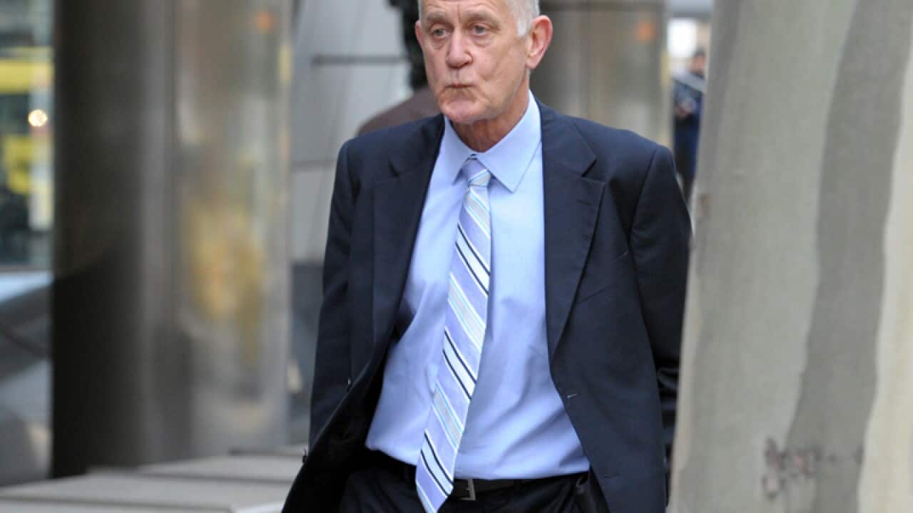 David Edwin Rapson leaves the county court in Melbourne.