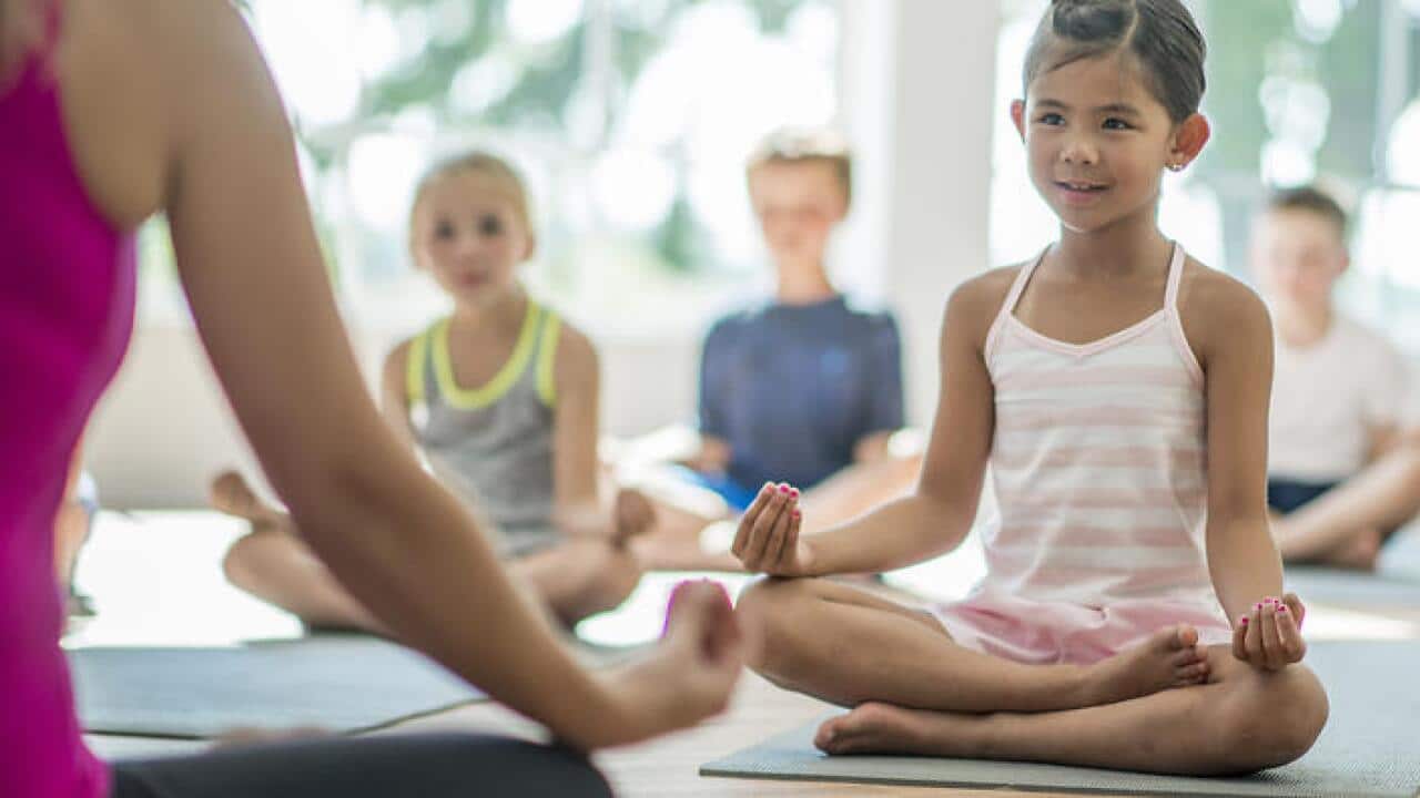 Teacher Leading a Meditation