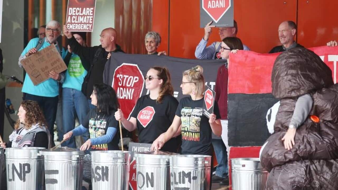 Anti-Adani protesters outside the Liberal Party campaign launch.