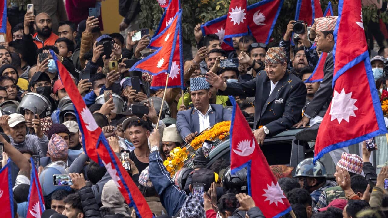 Pro-monarchy supporters rally to welcome former king in Kathmandu