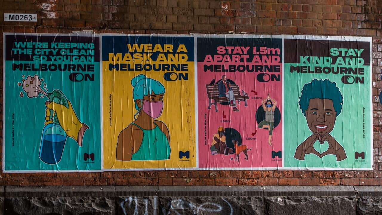 "COVID19 measures" related art work posters seen a street wall in Melbourne CBD. (Photo by Alexander Bogatyrev / SOPA Images/Sipa USA)