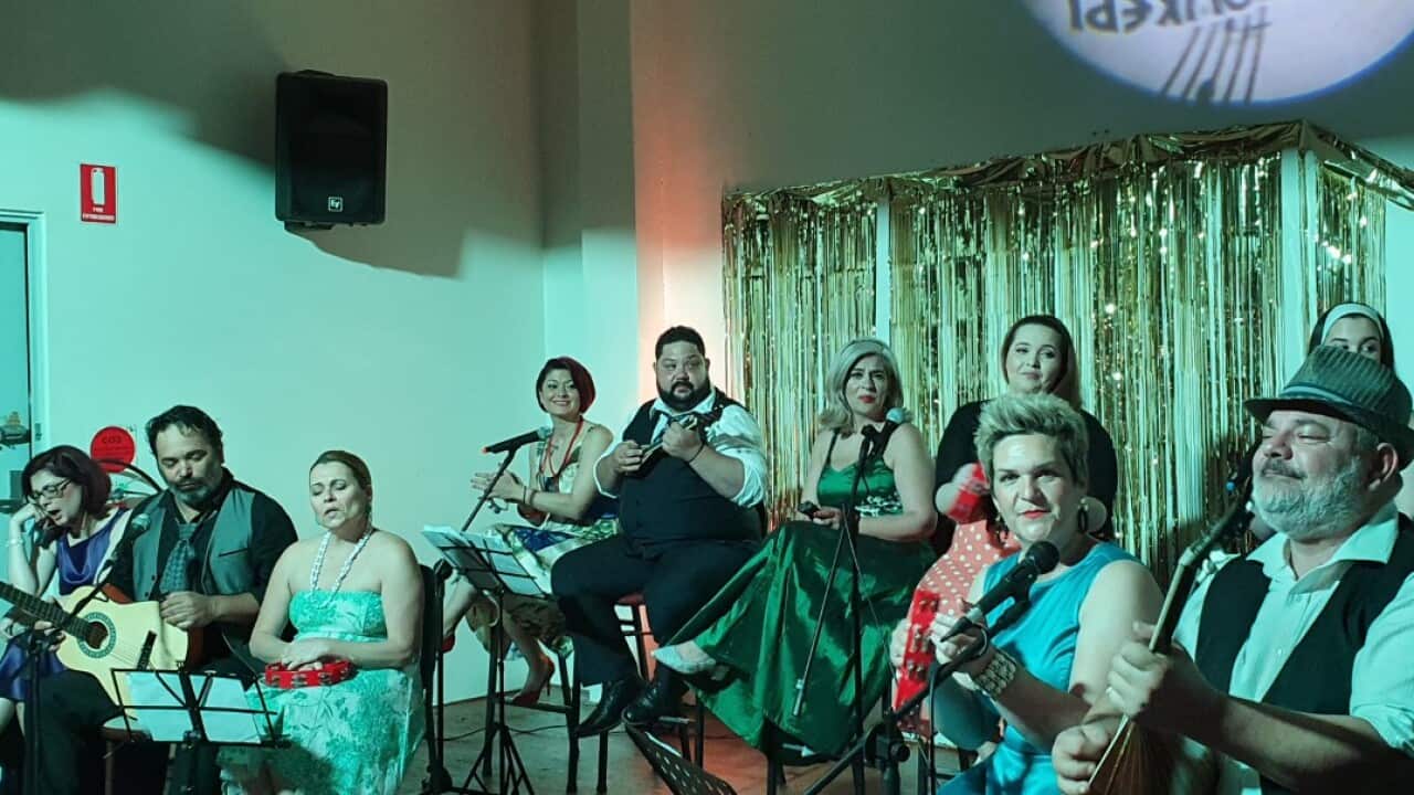 Members of Greek Stage Theatre performing during Bouzoukeri
