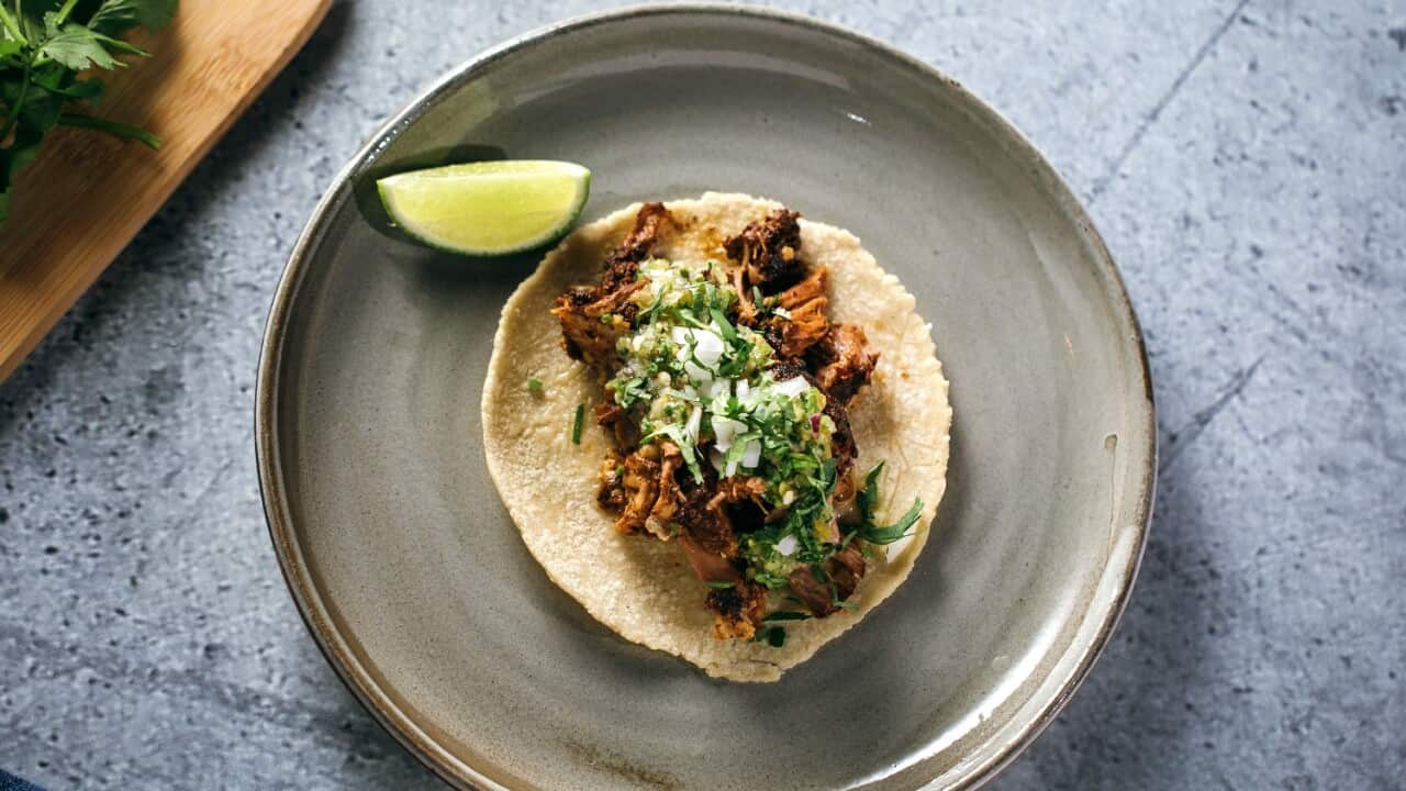 Lamb barbacoa with consomé, salsa verde and tortillas