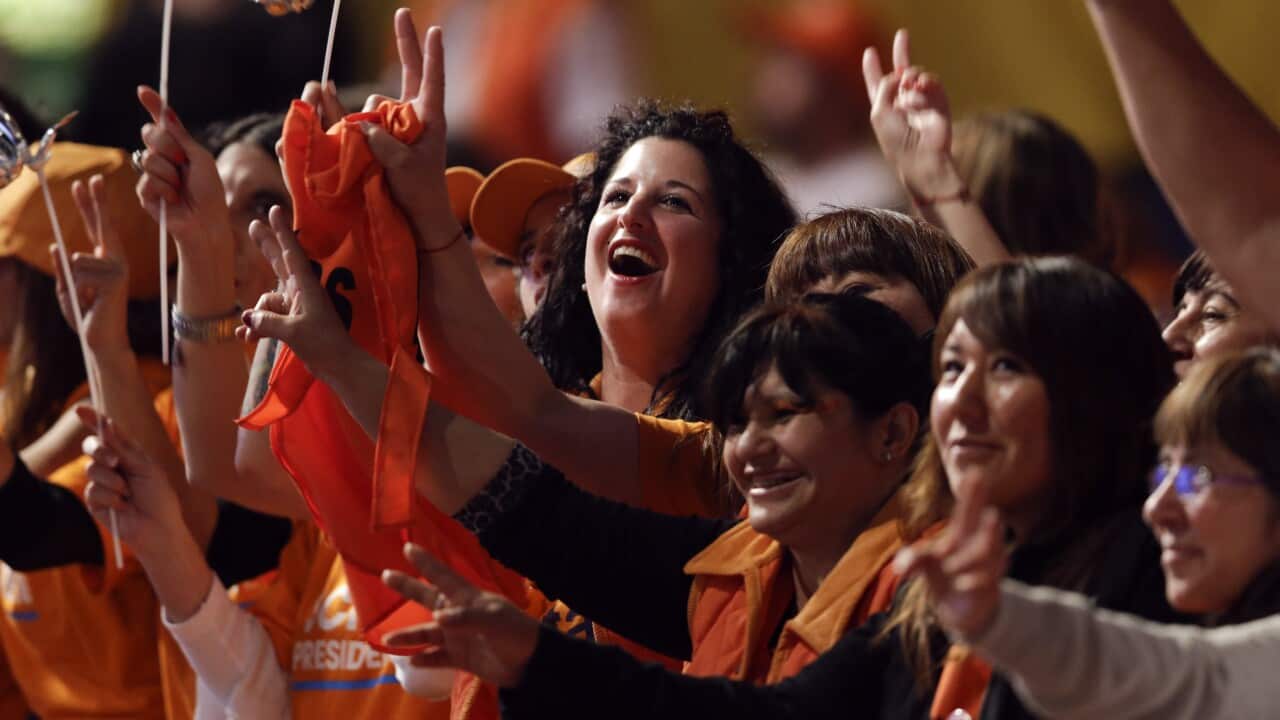 Supporters of ruling party presidential candidate Daniel Scioli chant slogans as they wait for their candidate at the Luna Park stadium in Buenos Aires, Argentina, Sunday, Oct. 25, 2015.(AP Photo/Victor R. Caivano)