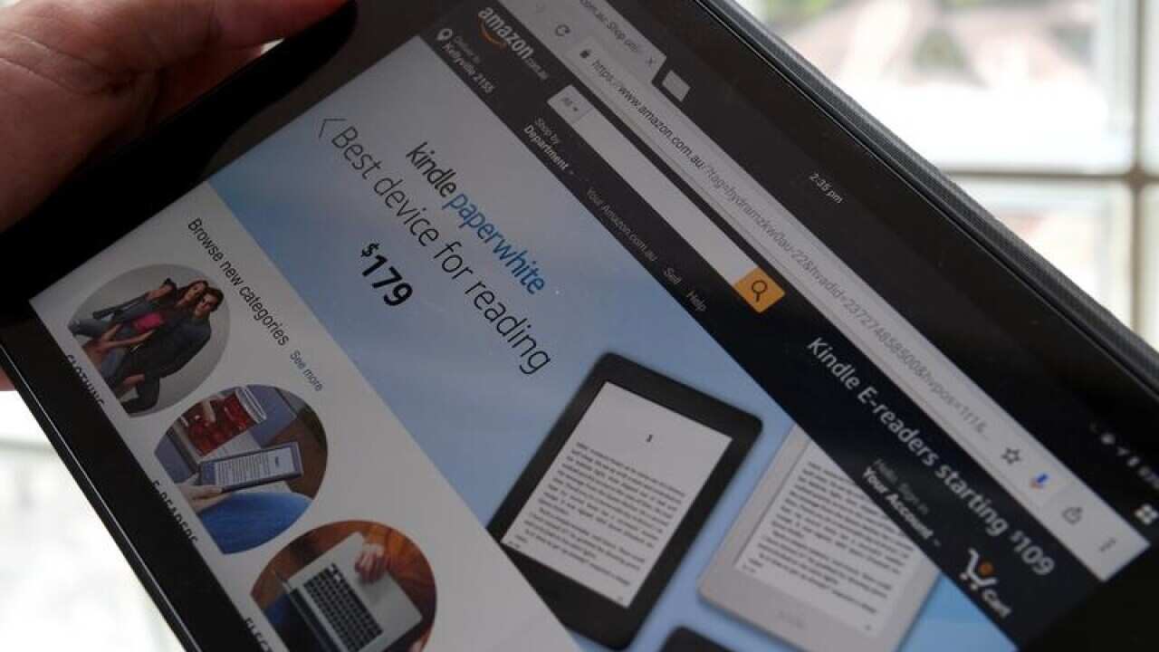 A tablet is seen displaying Amazon's Australian website.