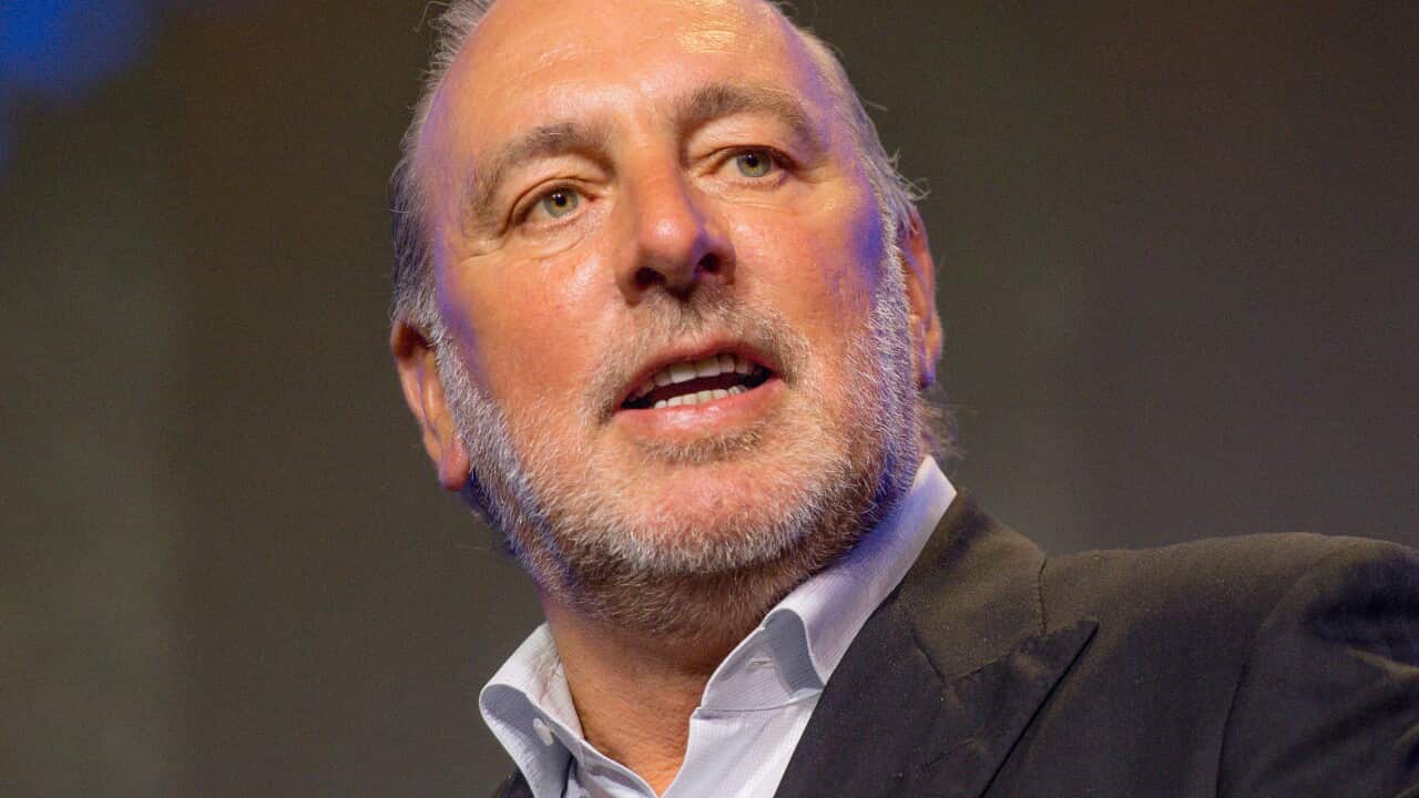 Hillsong founder Brian Houston is seen speaking.