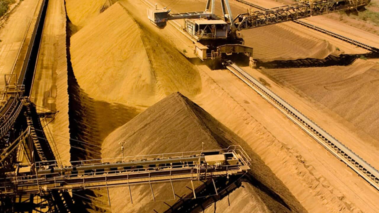 Iron ore piles at a mine in the Pilbara