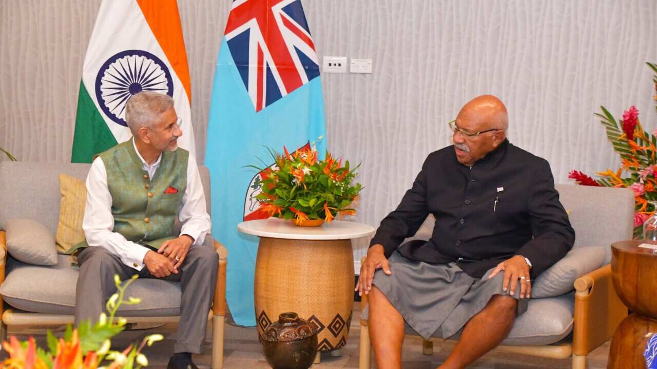 Fiji PM Sitiveni Rabuka (R) talking to India's External Affair Minister Dr Subrahmanyam Jaishankar (L) in Nadi.