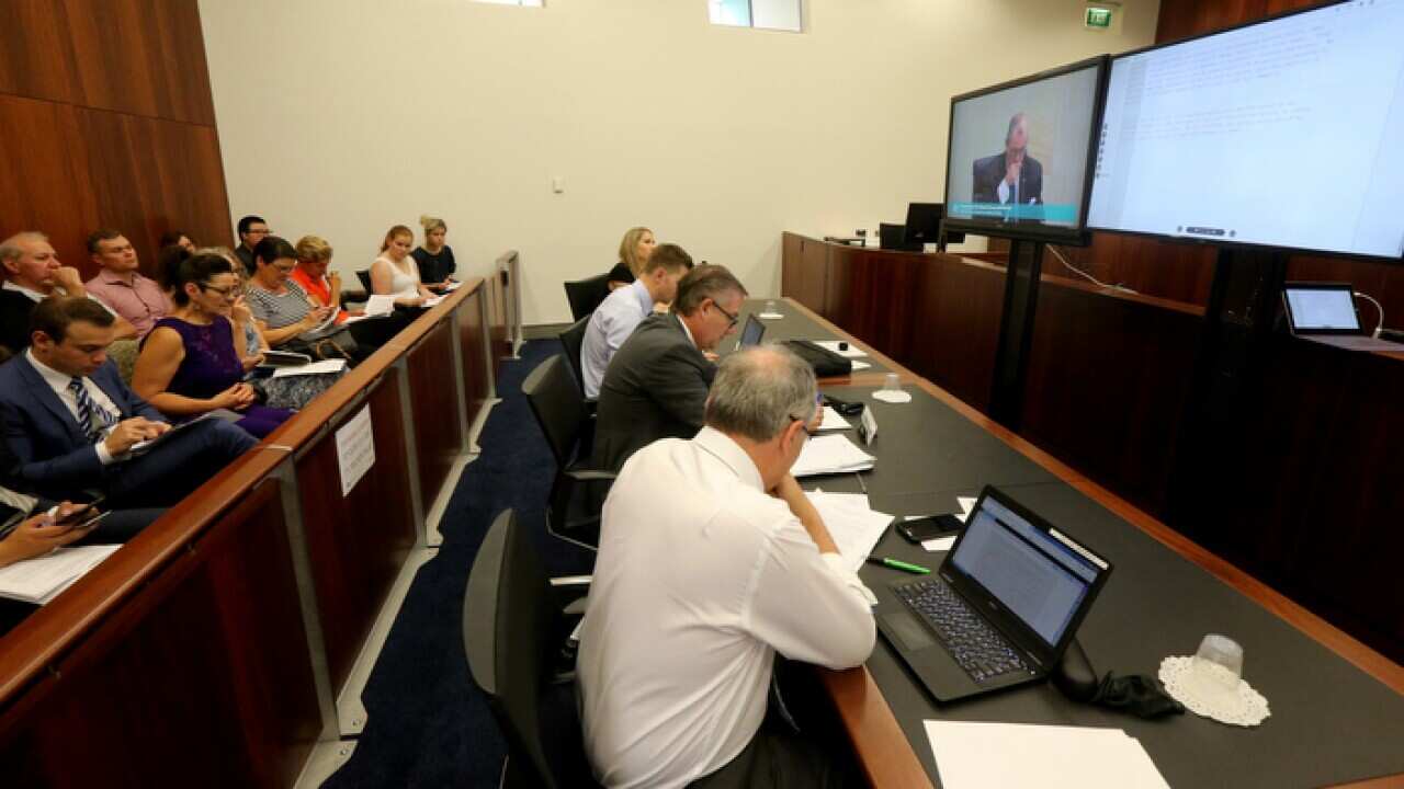 Media watch the first public hearing in the federal government's Royal Commission for Aged Care Quality and Safety at the Roma Mitchell Commonwealth Law Court Building in Adelaide, Friday, January 18, 2019. (AAP Image/Kelly Barnes) NO ARCHIVING