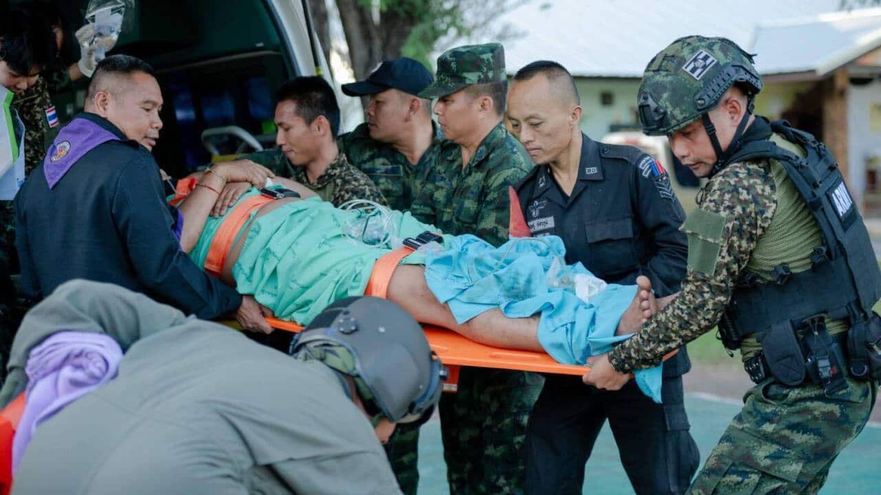 A Thai soldier wounded by gunfire from Cambodian soldiers is taken to hospital by helicopter for medical treatment in Thailand on December 08, 2025.