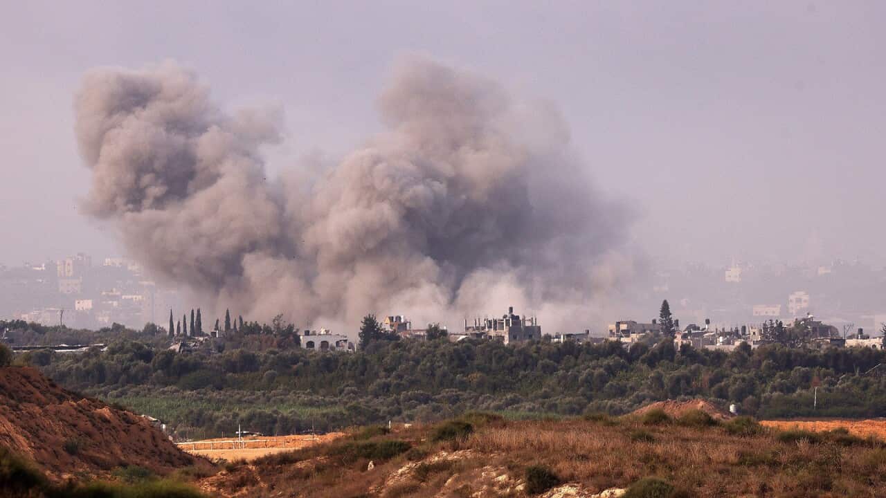 Smoke billows from ruined buildings in the northern part of the Gaza Strip, as seen from Sderot Israel, 11 November 2023.