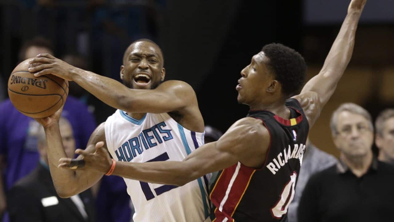 Charlotte Hornets' Kemba Walker (15), Miami Heat's Josh Richardson