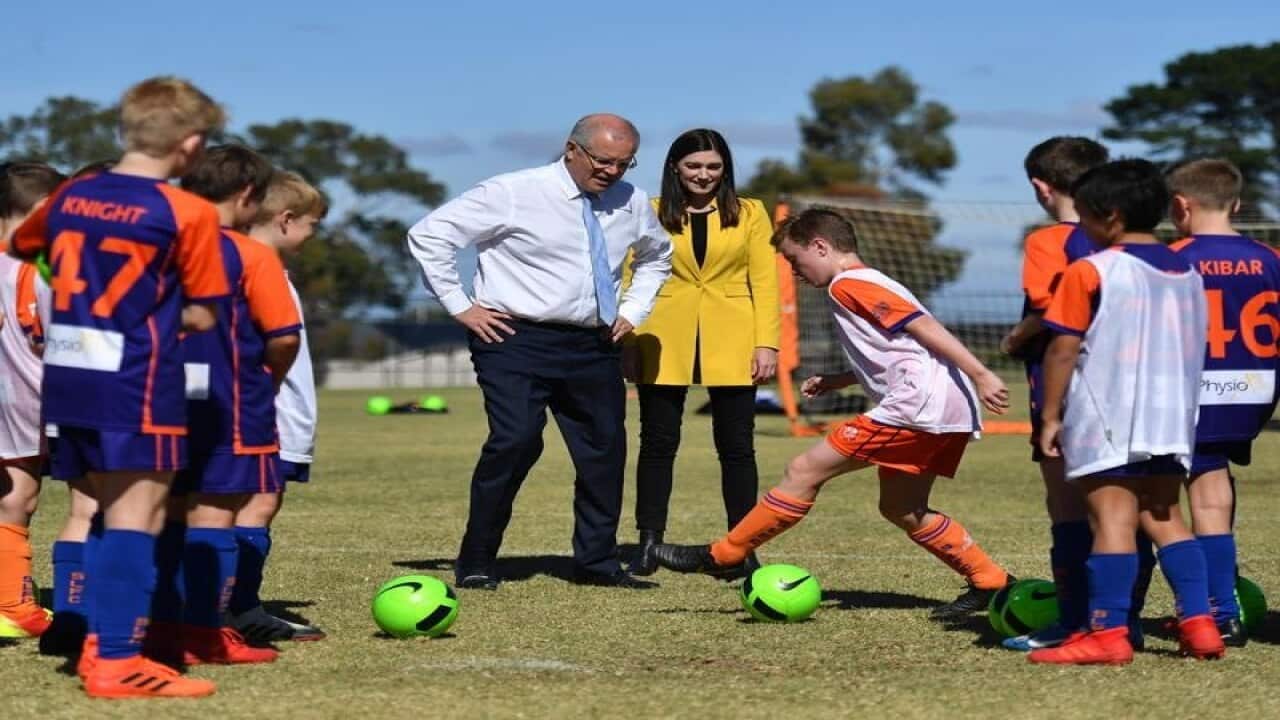 Scott Morrison and Nicolle Flint at junior soccer training.
