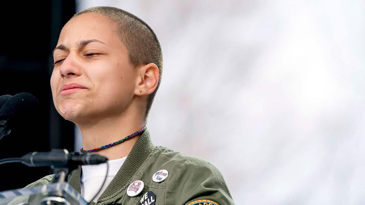 Emma Gonzalez, a survivor of the mass shooting at Marjory Stoneman Douglas High School closes her eyes and cries as she stands silently at the podium. 