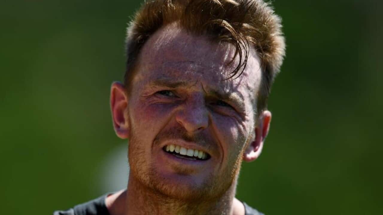 Brendon Goddard looks on