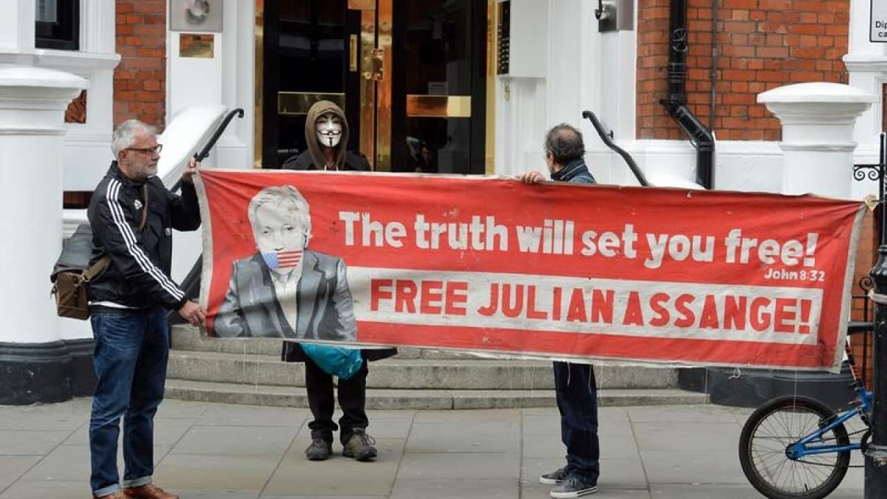 Supporters of Julian Assange outside the Ecuadorian embassy in London