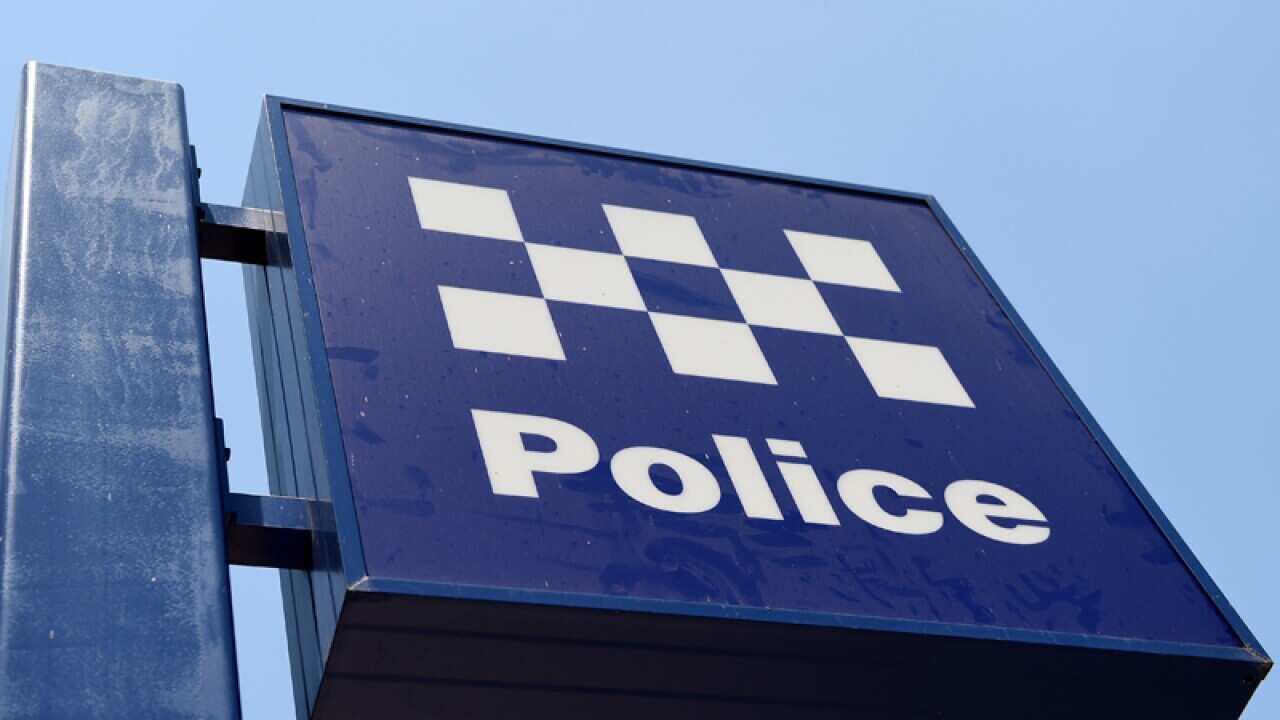 A police station sign