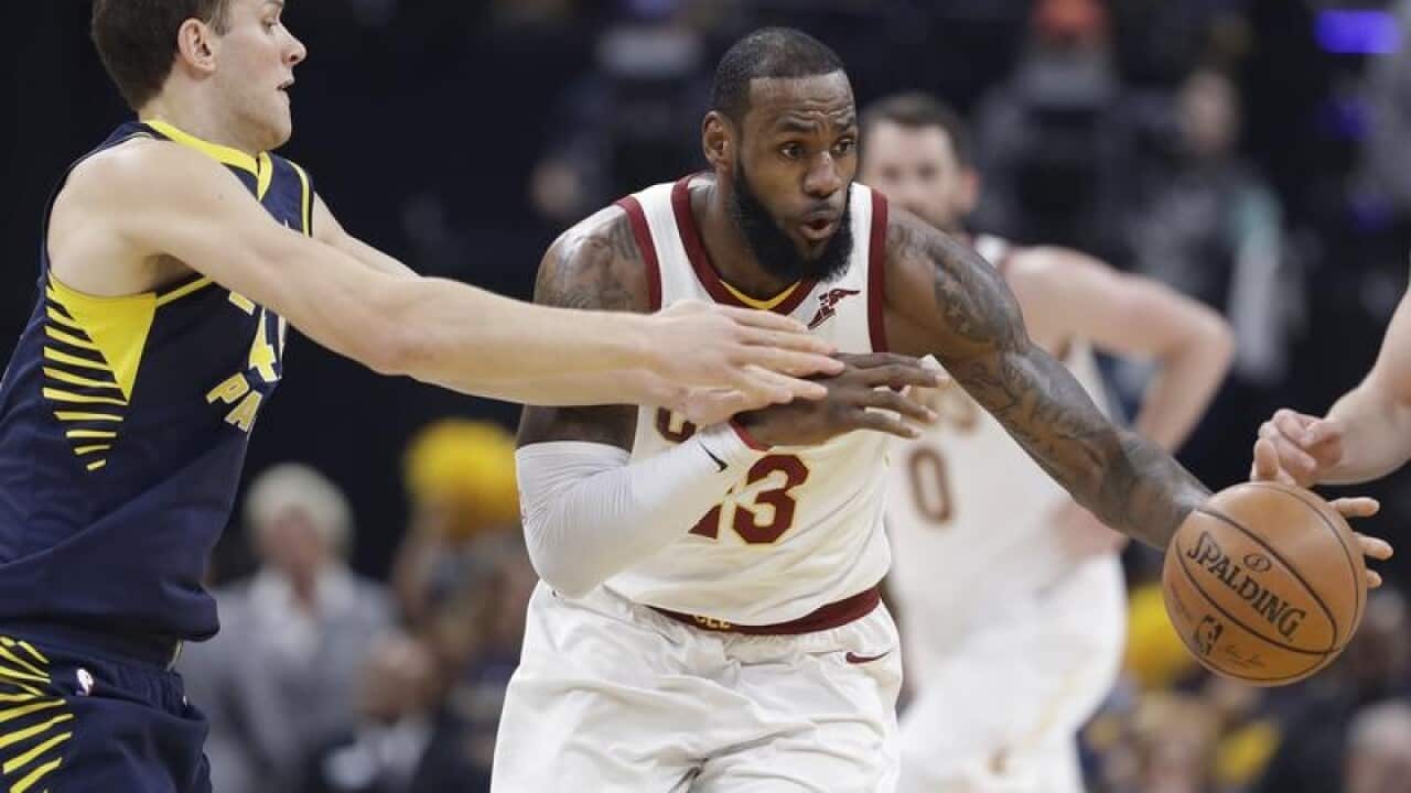 Cleveland Cavaliers' LeBron James dribbles