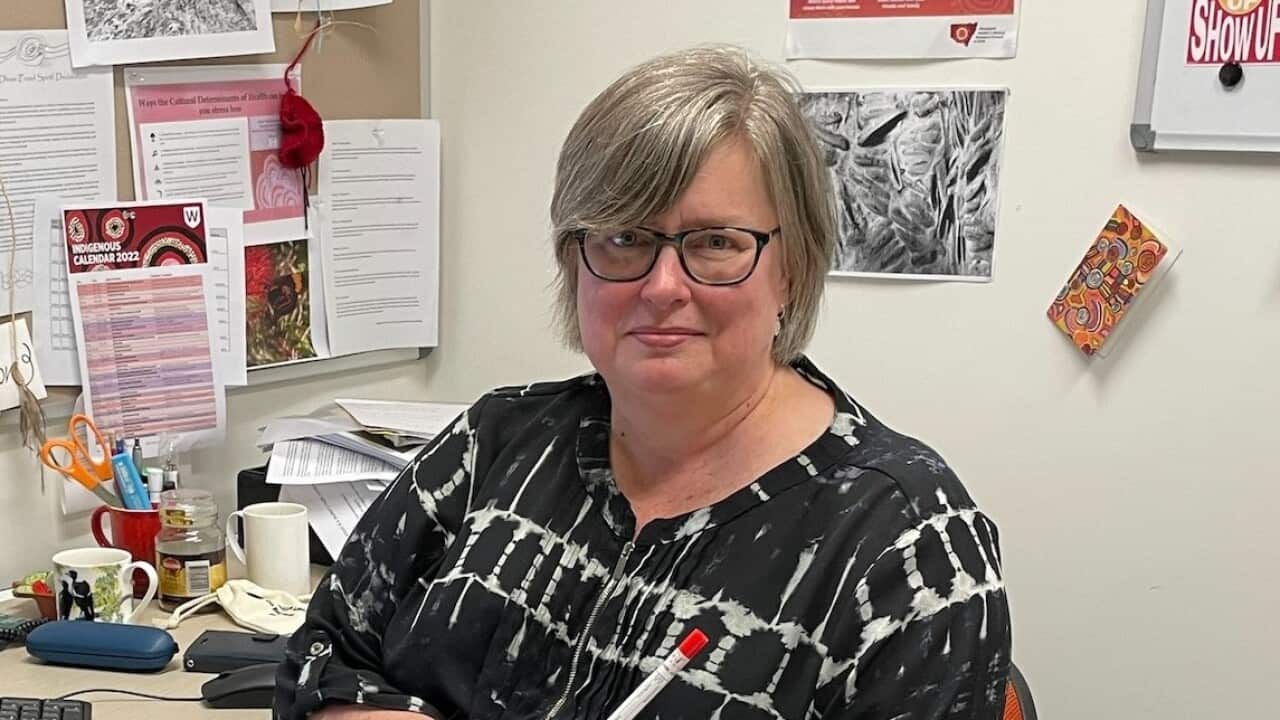 Registered nurse and Wiradjuri woman Alison Barnes holding a new self screening swab (SBS-Sandra Fulloon).jpg