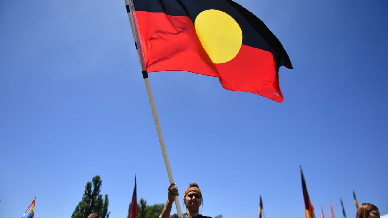 Protestors at an Invasion Day rally at the Aboriginal Tent Embassy, outside Old Parliament House in Canberra, Thursday, Jan. 26, 2017. (AAP Image/Mick Tsikas) NO ARCHIVING