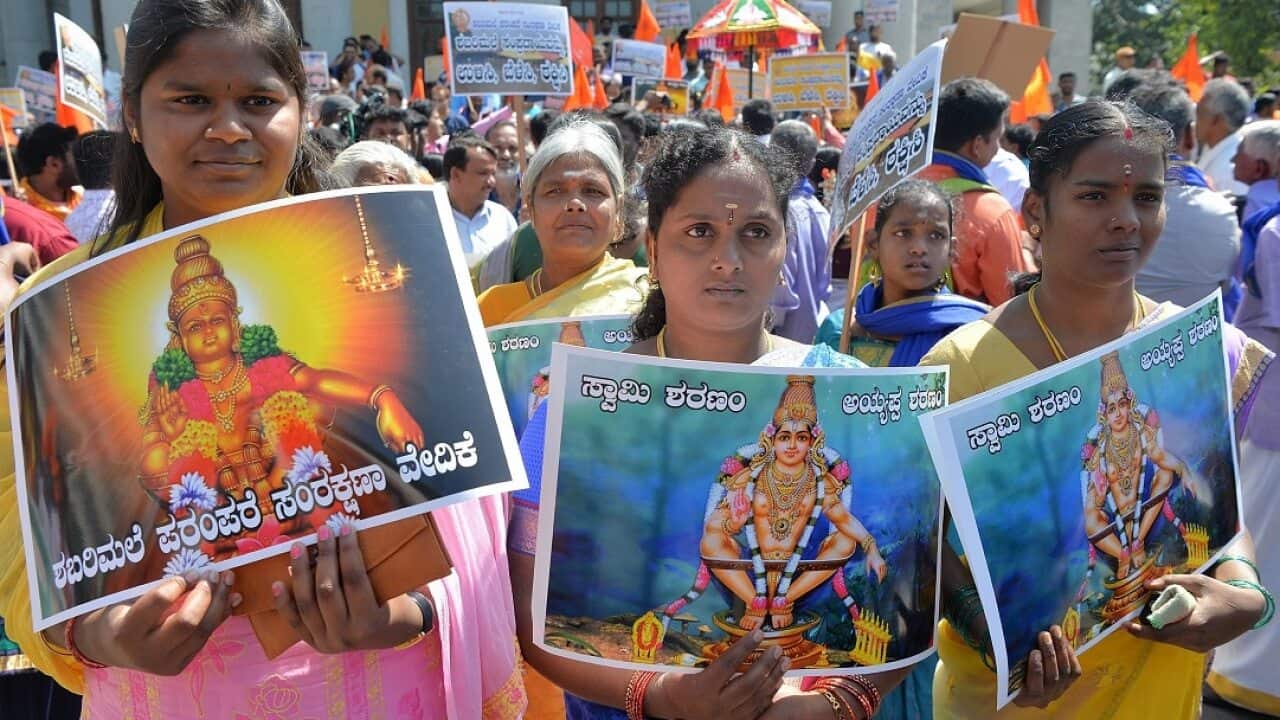 Devotees of Hindu god Ayyappa call for a reversal of a Supreme Court decision to allow women of "menstruating age" into the Sabarimala Temple.