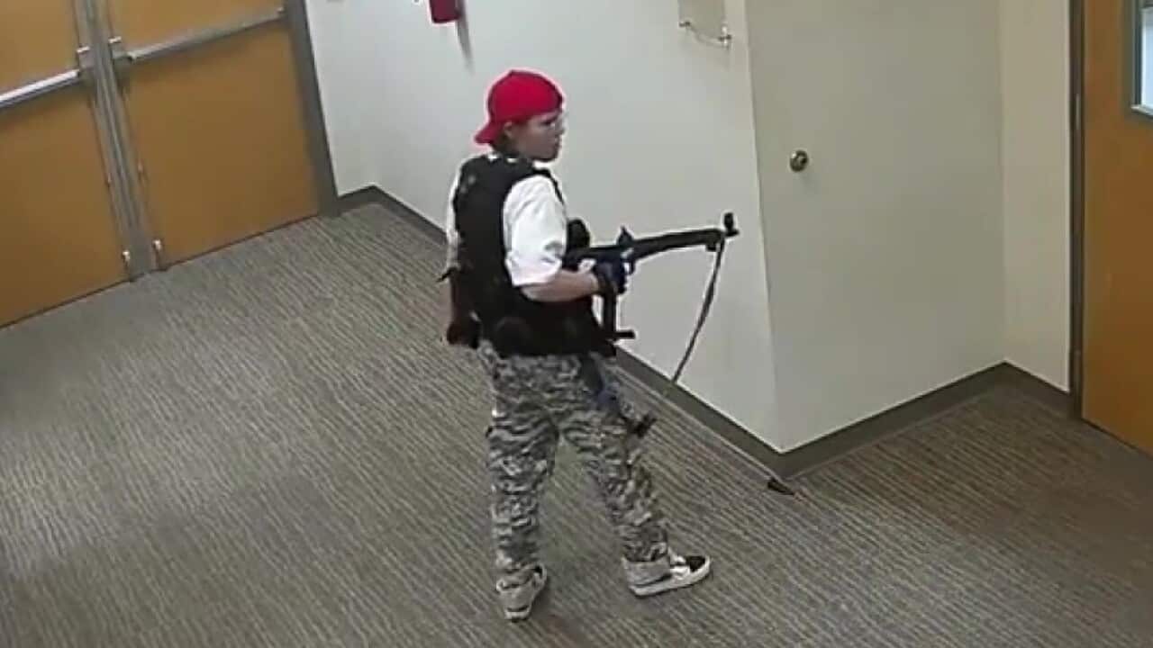 CCTV footage of a shooter inside a school