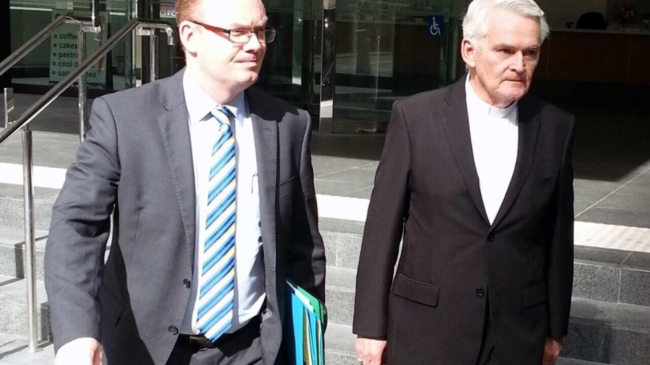 Catholic bishop Max Leroy Davis (R)